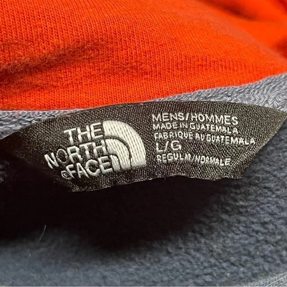 The North Face Men's Navy Hoodie with Orange Logo
